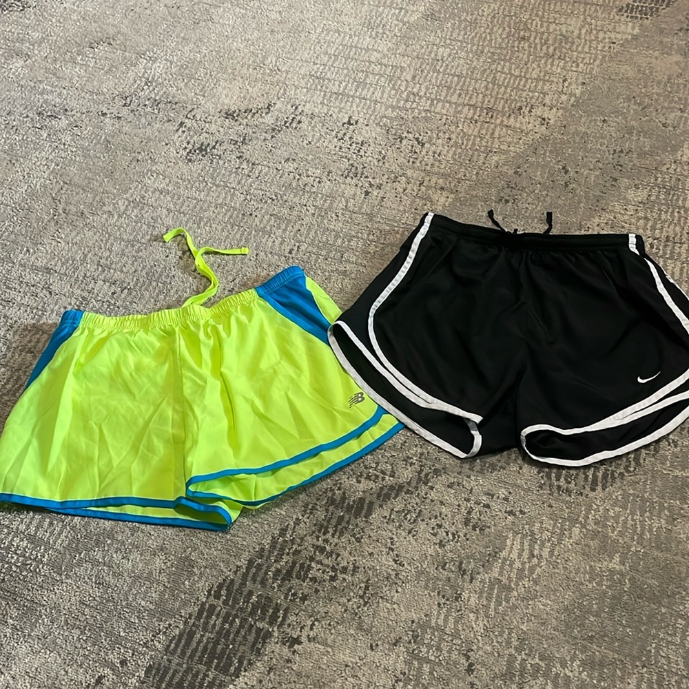 2 pair ladies athletic shorts neon New Balance & black Nike shorts Both Sz M